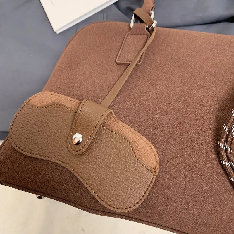Spacious Suede Style: The Big-Capacity Crossbody Bowling Bag.